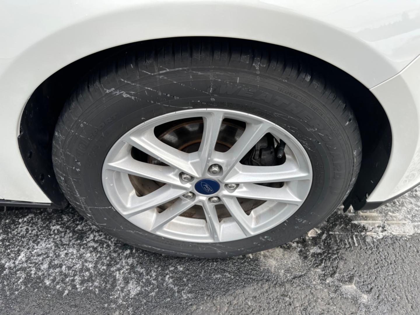 2018 White Ford Focus SE Sedan (1FADP3F20JL) with an 2.0L L4 DOHC 16V engine, Auto transmission, located at 8464 Route 219, Brockway, PA, 15824, (814) 265-1330, 41.226871, -78.780518 - Clean, well taken care of Ford Focus Se Sedan with 4 cylinder engine, air condition, power windows and locks, factory alloys and only 71000 miles. This pre owned car has been serviced, Pa-Inspected, and comes with warranty. Stop in or call one of the Morelli boys today to see this car which is pric - Photo#11